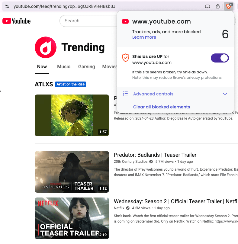 Brave Shields menu expanded on desktop, showing 'Clear all blocked elements' menu item